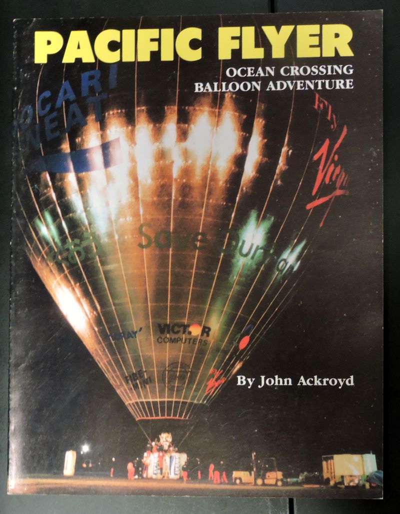 Book cover showing inflated metallic balloon against black sky ready for take off.